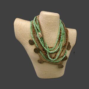 KJL Multi Strand Green Glass, Wood and Metal Beaded Necklace. Hammered Coin